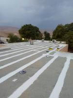 איטום גג באמצעות הלחמת יריעות ביטומניות שמבצעת חברת האיטום "מבראשית איטום בניה ואיטום"